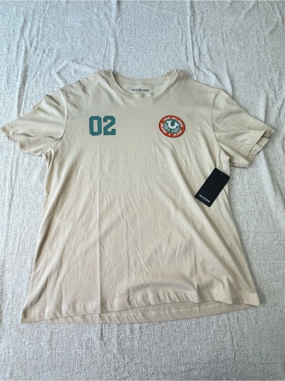True Religion Cream Short-Sleeve Tee with Teal '02' and Orange Patch